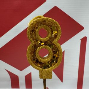 VELA NUMERO 8 GIBREADA CON PALITO 20 CM DORADO IMP